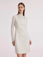 a woman in a-line jersey dress